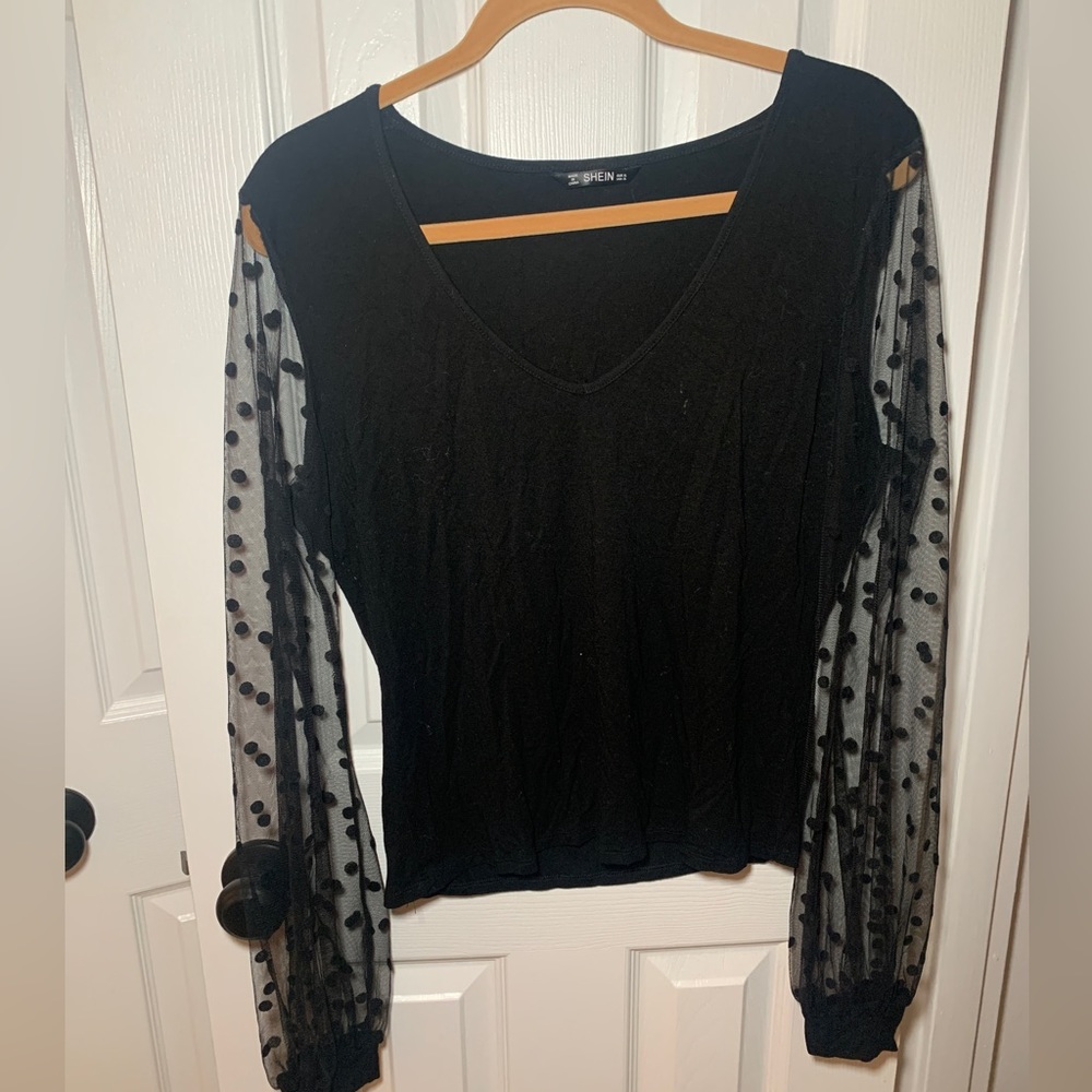 Black polka dot blouse